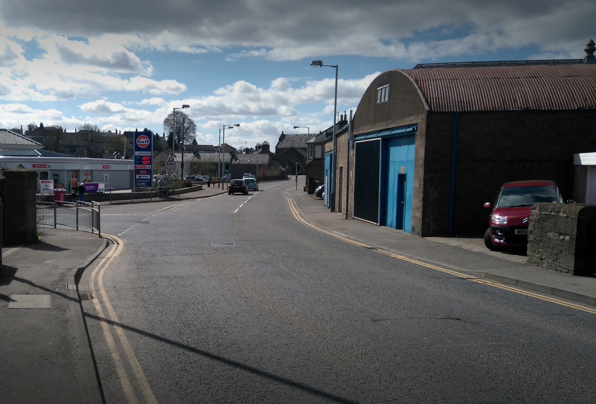 The junction at Academy Street, facing west.