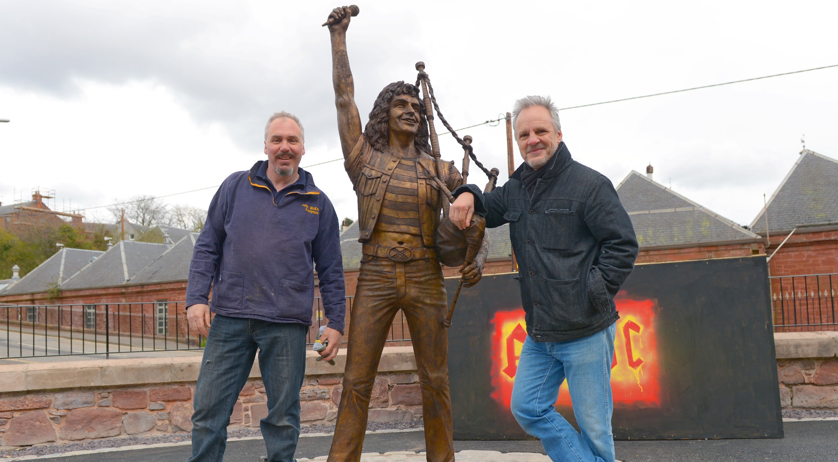 Sculptor John McKenna (left) with Mark Evans, former AC/DC bass player