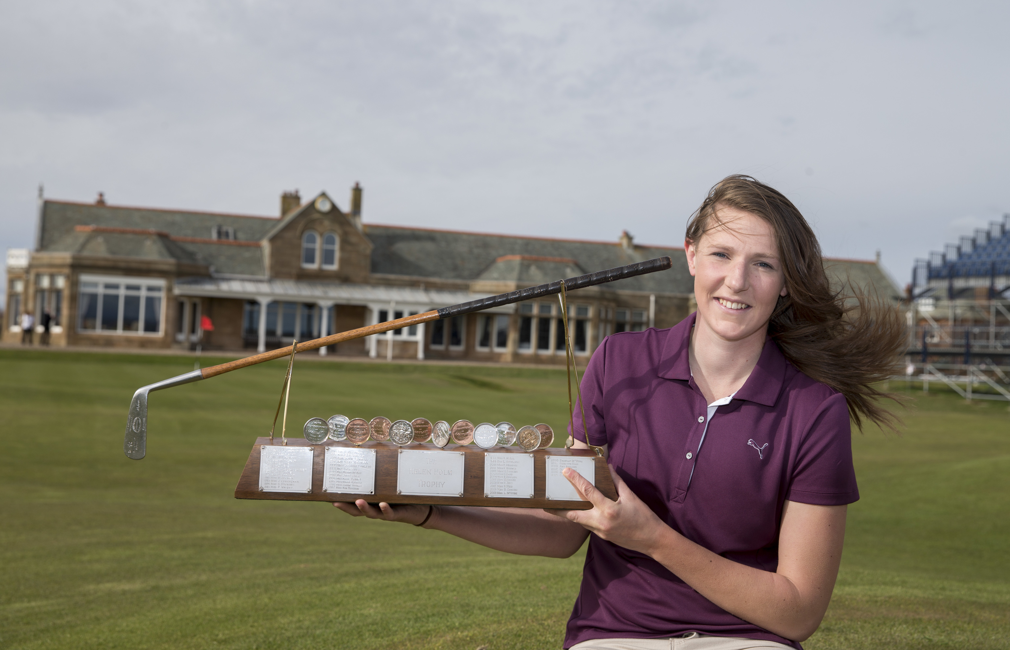 Olivia Winning proudly shows off the Helen Holm trophy.