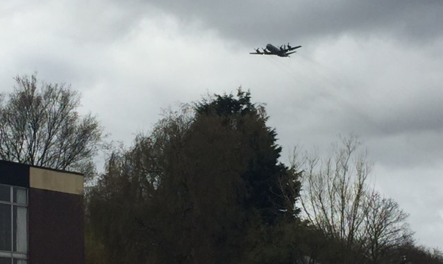 A plane from 333 Royal squadron of The Royal Norwegian Air Force flies over Wormit Primary School