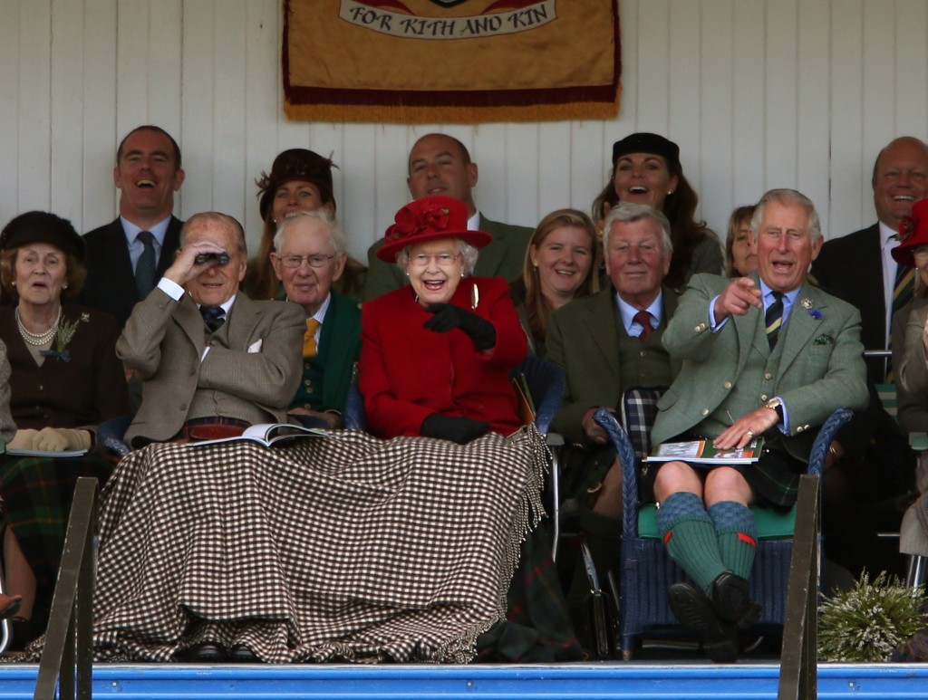 Photo shows the Queen, with the Duke of Edinburgh and Prince Charles and guests in the royal box at the Braemar Highland Gathering.