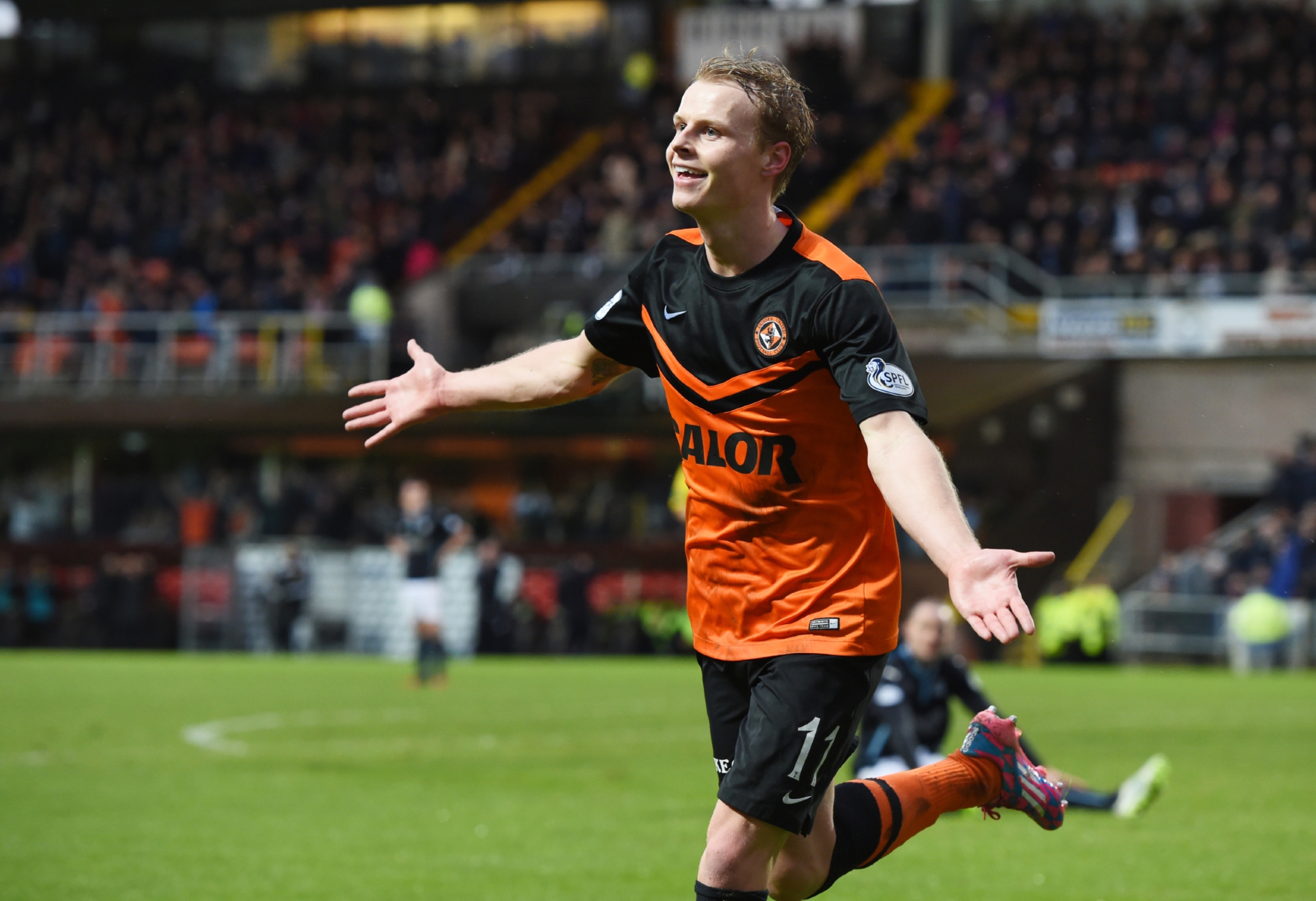 Happier days for United as Gary Mackay-Steven scores the fourth goal in the 6-2 win over Dundee.