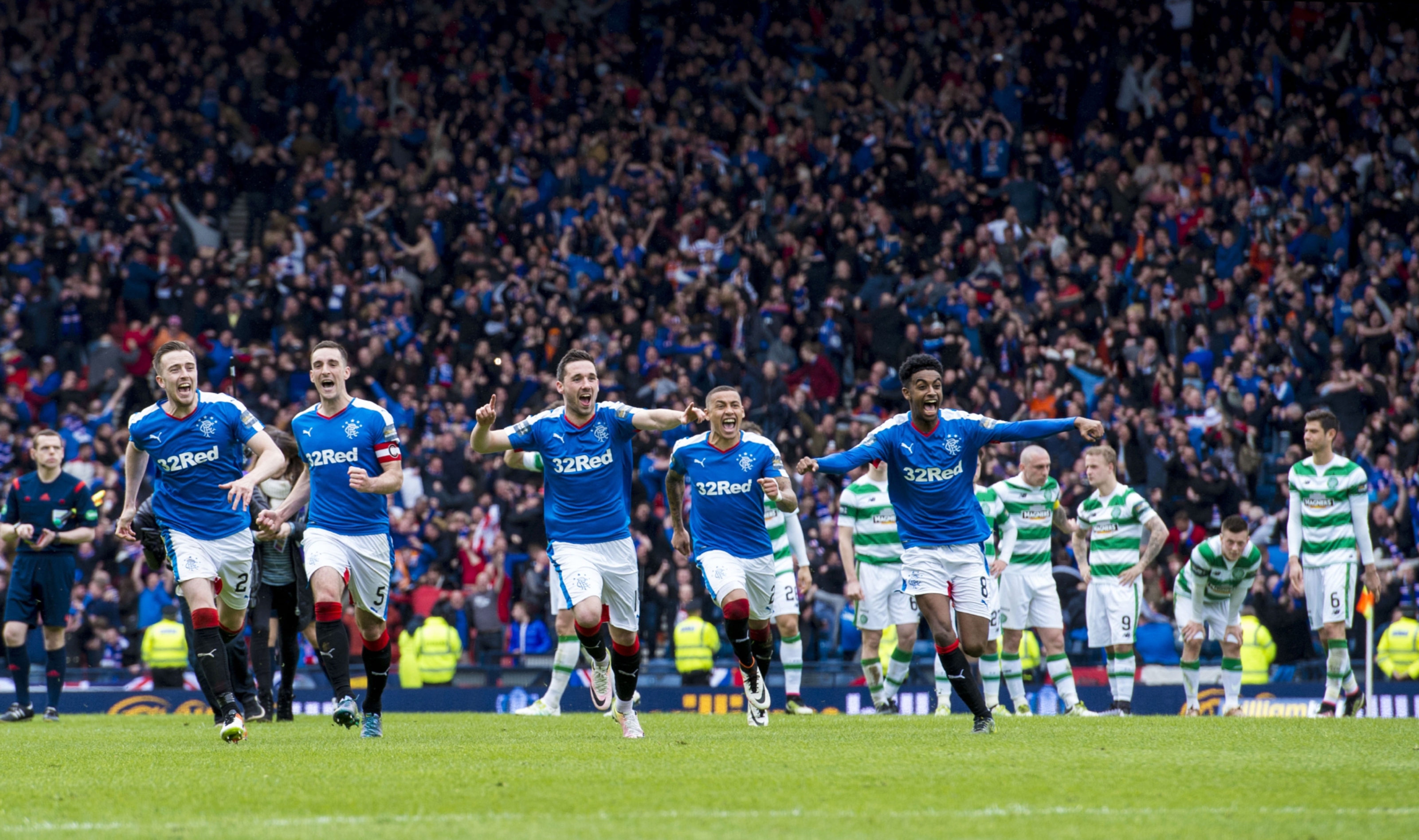 Rangers celebrate the winning moment.