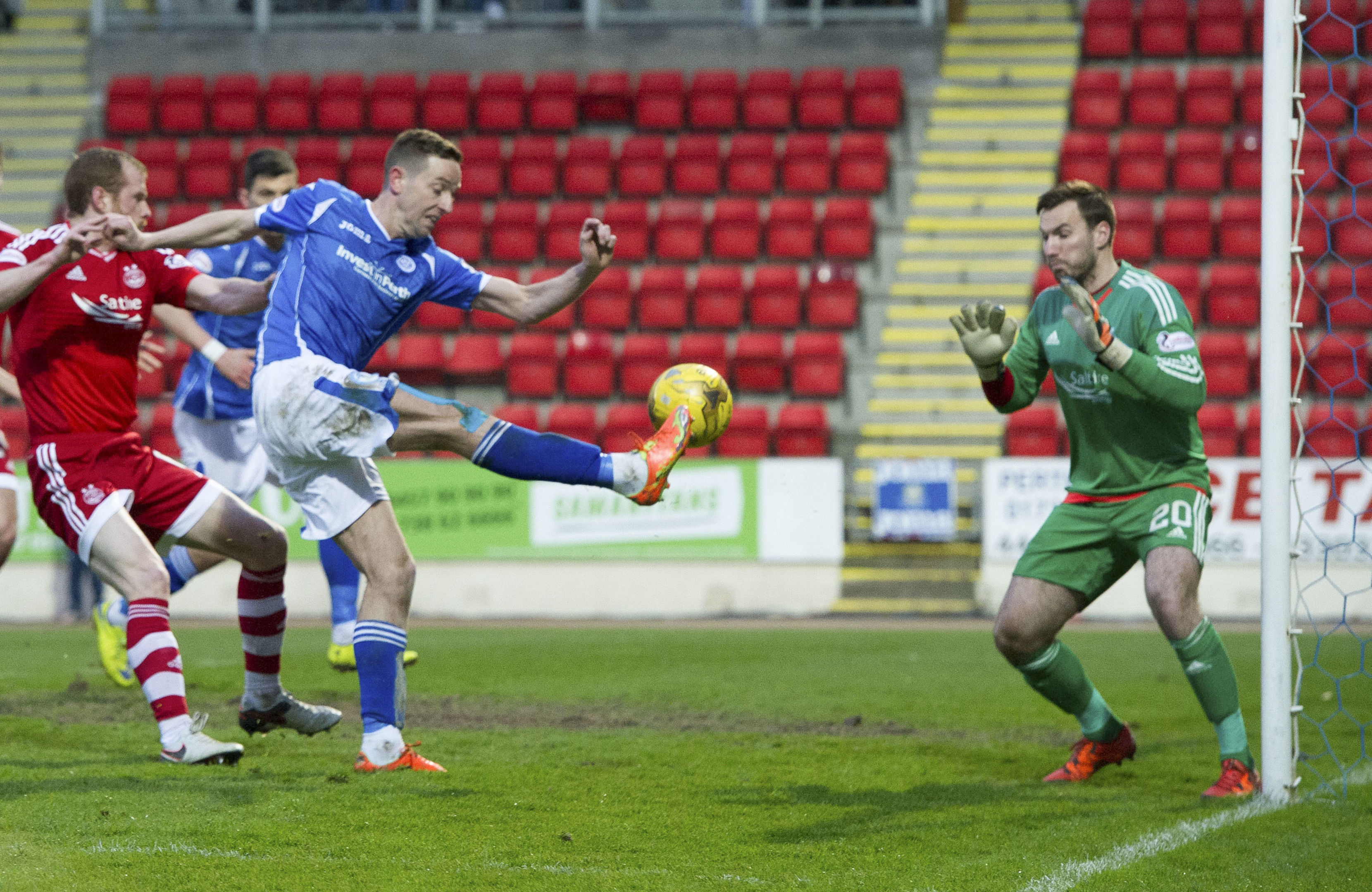 Steven MacLean scores against Aberdeen.