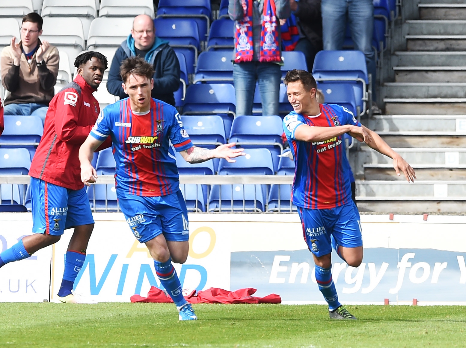 Inverness CT's Greg Tansey (left) celebrates after he scores a penalty for his side.