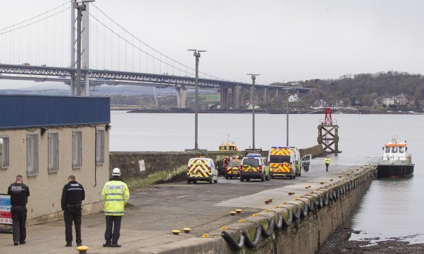 Emergency services at the pier in South Queensferry after Thursday's accident