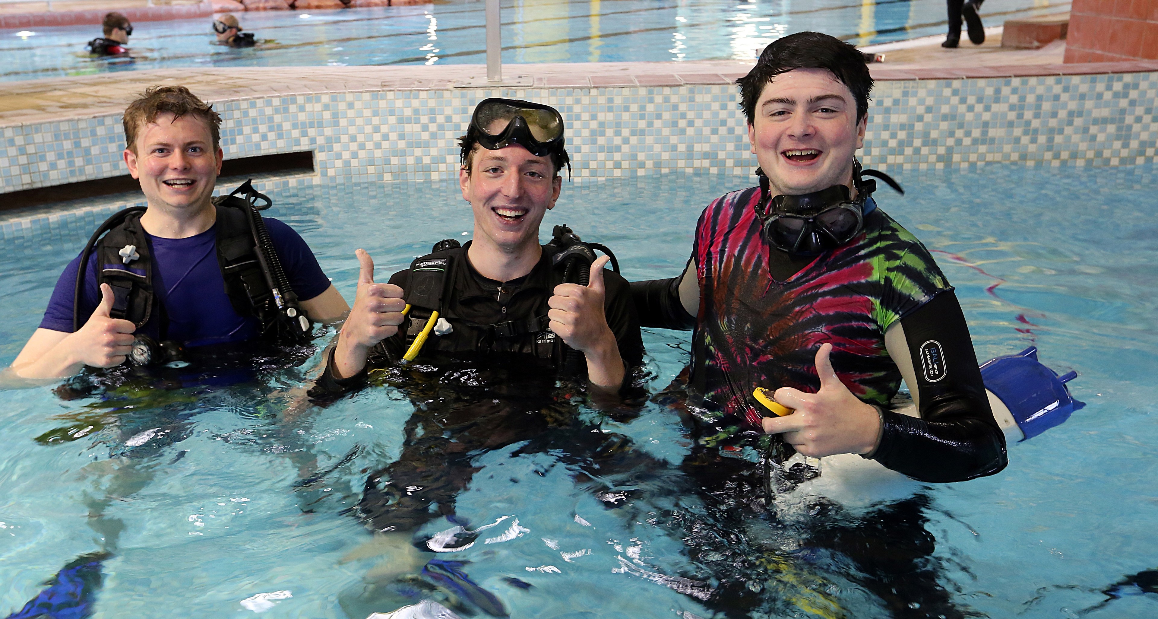 From left, Mark Jones, Harry Gunning and Neil Coupland complete three hours in the pool.