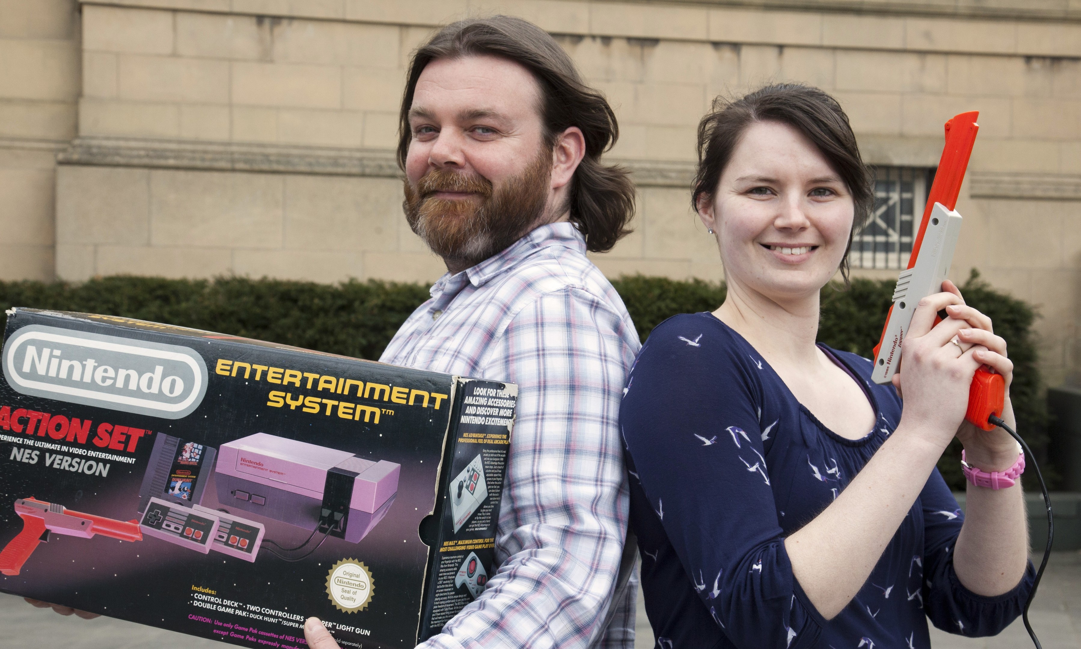 Perth Museum and Art Gallery's design and publicity officer Paul Ritchie and event officer Joanna Dick with a retro NES console.