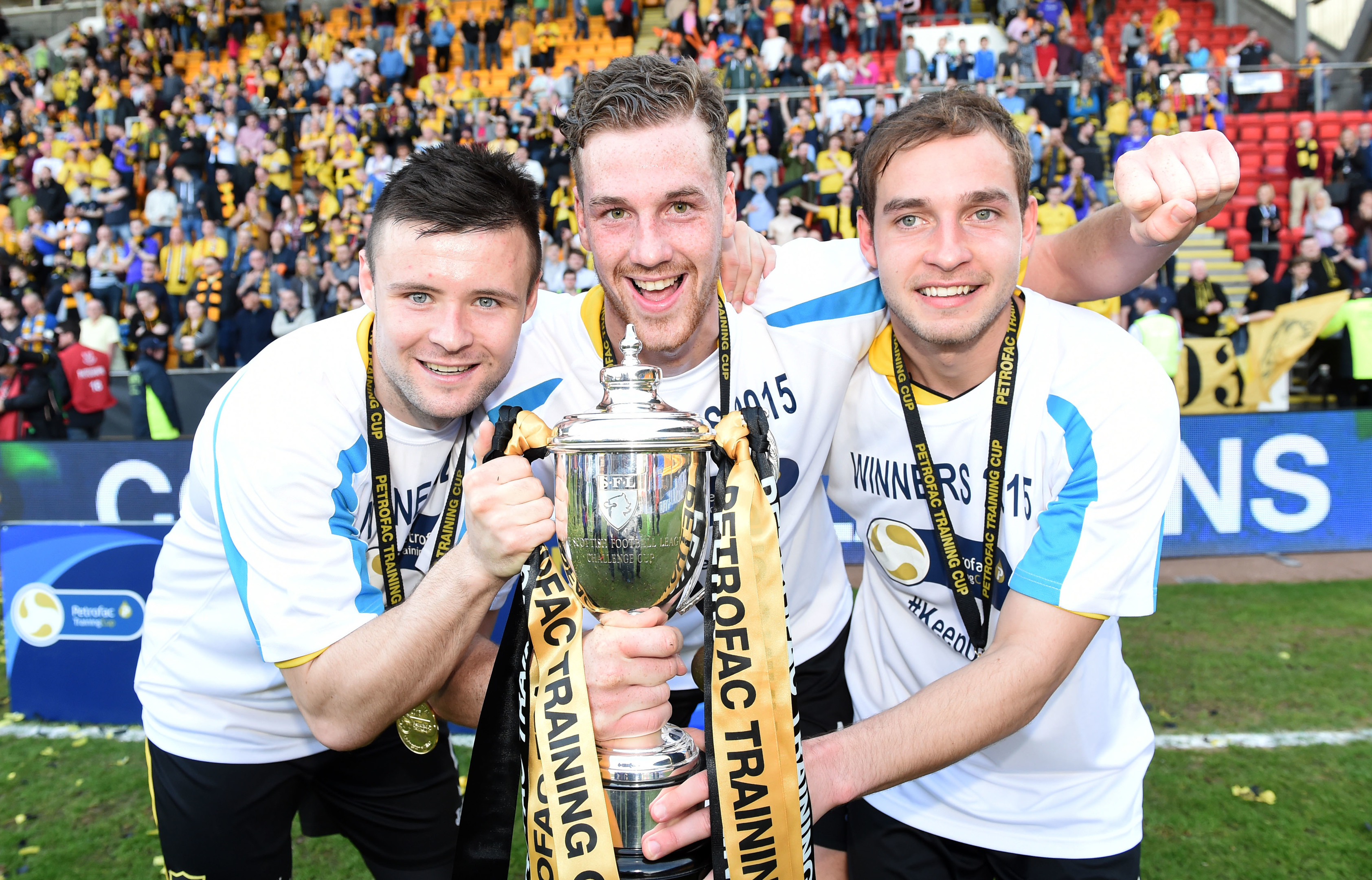 Callum Fordyce (left) has lifted a trophy with Livingston.