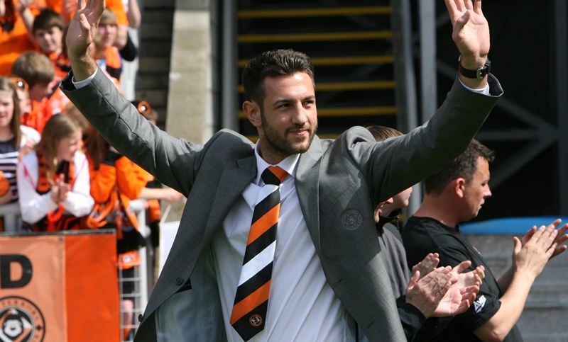 Mihael Kovacevic takes the Tannadice acclaim after United's triumph in 2010.