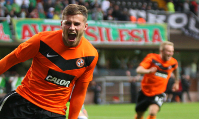 David Goodwillie might come back into the picture at Tannadice just as Johnny Russell (right) looks like heading away.