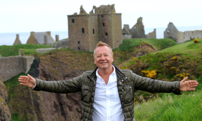 Jim Kerr launches the Stonehaven Hogmanay party programme at Dunnottar Castle.