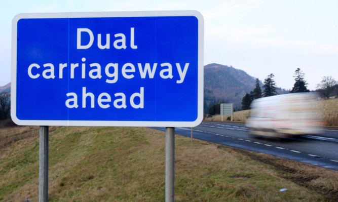 Kris Miller, Courier, 31/01/12. Picture today shows Dual carriageway ahead sign near Pitlochry for story about dualling of A9.