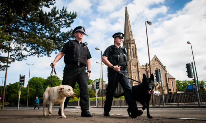 PCs Mike Gray and Rory Duncan out on the beat in Lochee.