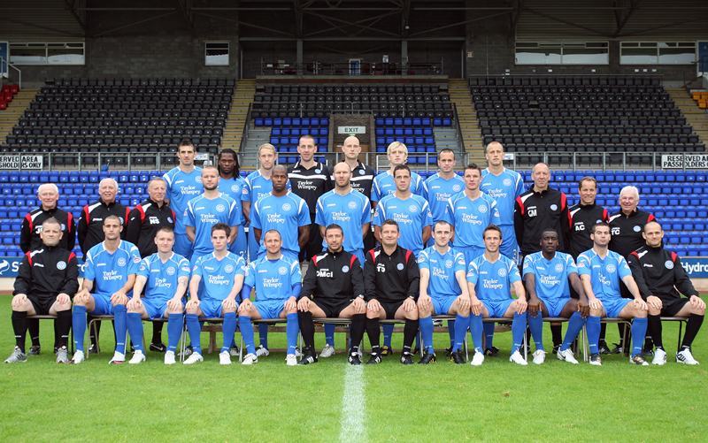 Kris Miller, Courier, 09/08/10, News. Picture today at McDiarmid Park, Perth. Pic shows the full St Johnstone squad 2010/2011 (minus Murray Davidson who is on International duty). Back row L/R, Scott Dobie, Collin Samuel, Steven Anderson, Graeme Smith, Peter Enckelman, Liam Craig, Steven Milne, Danny Grainger. Middle row L/R, Jocky Peebles, Atholl Henderson, Nick Summersgill, Kevin Rutkiewicz, Michael Duberry, Sam Parkin, Graham Gartland, Martin Hardie, Gordon Marshall, Alec Cleland, Tommy Campbell. Front row,**unknown, Marcus Haber, Andy Jackson, Kevin Moon, Jody Morris, Derek McInnes, Tony Docherty, Dave Mackay, Chris Millar, Cleveland Taylor, Peter MacDonald, **unknown.