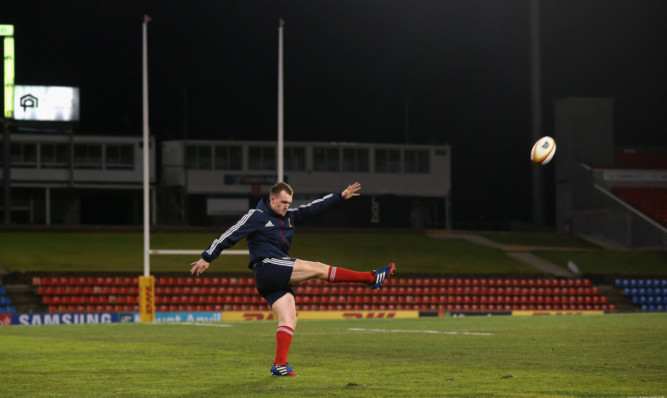 Stuart Hogg puts in some kicking practice at the venue for todays game, Hunter Stadium, Newcastle.