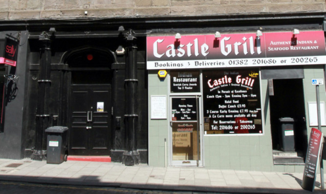 Castle Grill next to Non-Zeros shook with noise from the music venue.