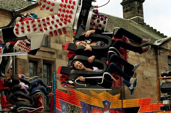 John Stevenson, Courier,10/08/10.Fife,St Andre
ws,South Street.The Lammas Fair final day,pic shows these girls as they hurl through the air on the Extreme ride.