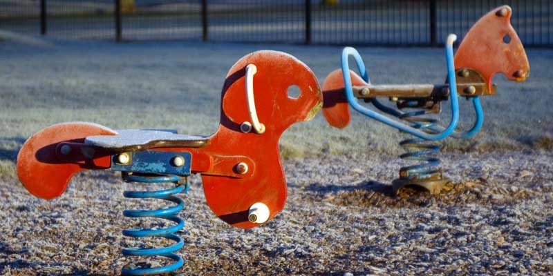 Two very cold rocking horses in the childrens' playground at Baxter Park