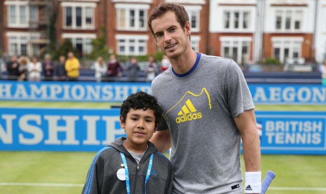 Andy Murray with Elijah Ortiz-Herrera at Queens Club.