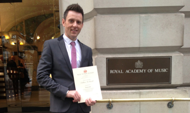 Callum with his award.