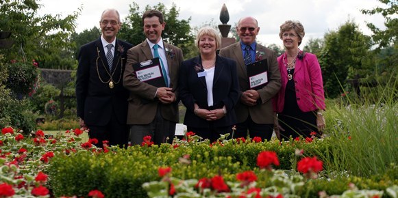 Steve MacDougall, Courier, Rodney Gardens, Bridgend, Perth. Britain In Bloom judges visiting. Pictured, left to right is Provost John Hulbert, judge Roger Burnett, Euna Scott (Chairman of Beautiful Perth), judge Jon Wheatley and Provost's wife Sarah Hulbert (check spelling please).