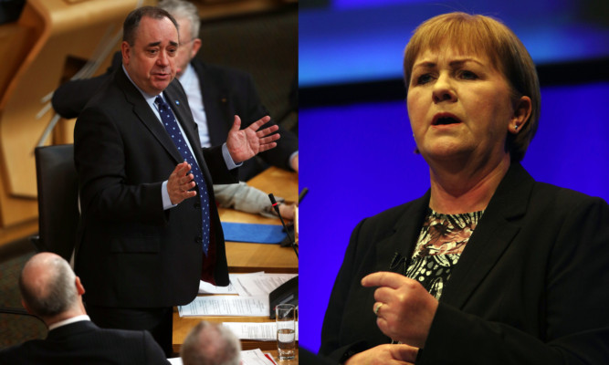Alex Salmond said the SNP would axe the bedroom tax but Johann Lamont claimed his plans were not credible.
