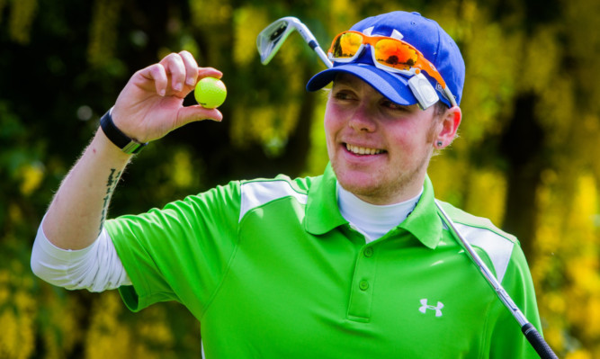 Partially-sighted Kris Adams hit a hole-in-one at the first tee at the Montgomery Course, Kinross.