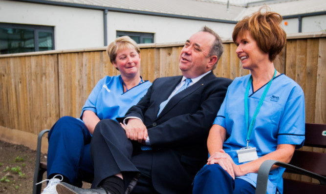 Mr Salmond chats with senior staff nurse Lynn Bryson, left, and practice development nurse Kate Wright.