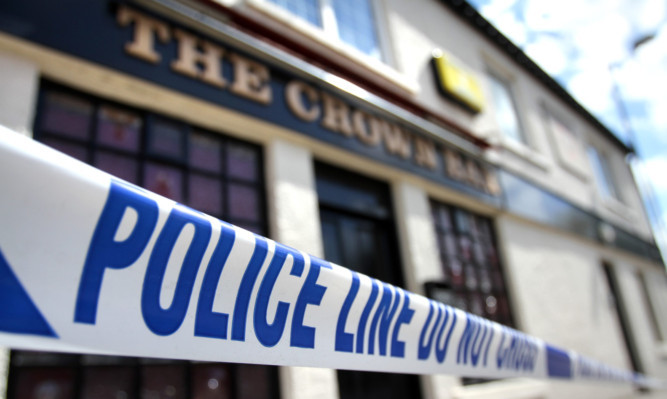 Police tape outside The Crown Bar in Blairgowrie.