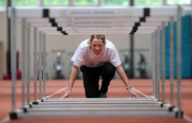 Poster girl: Eilidh Child will try to emulate her silver medal performance in Delhi three years ago at the 2014 Commonwealth Games in Glasgow.