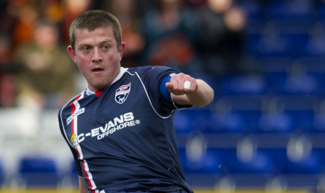 Richard Brittain in action for Ross County.