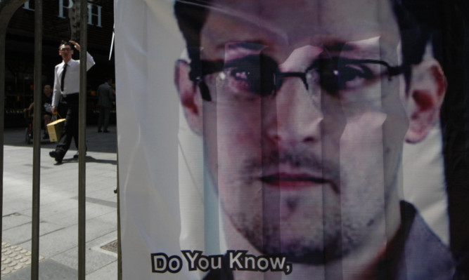 A banner supporting Edward Snowden displayed in Hong Kong.