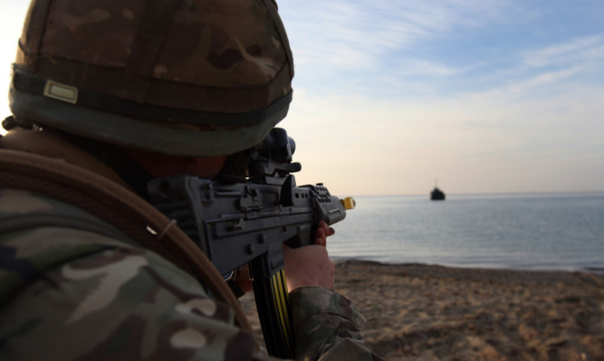 Kris Miller, Cyprus, 51st Highland, 7th Battalion the Royal Regiment of Scotland. 7 Scots final day and final assualt. Pic shows a soldier watching the second landing craft approach. Army, troops, soldiers, TA, Territorial Army, AR, Army Reserve 2020.