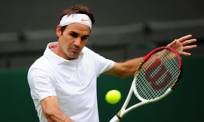 Switzerland's Roger Federer in action against Romania's Victor Hanescu.