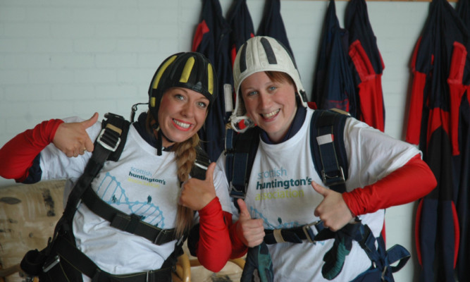 Gemma Barclay and Judith Barber after their parachute jump to raise awareness of the Scottish Huntingtons Association.