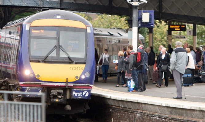 The Scottish Conservatives are seeking a debate on a direct link from Perth Railway Station to the capital.
