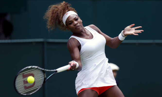 USA's Serena Williams in action against Luxembourg's Mandy Minella.