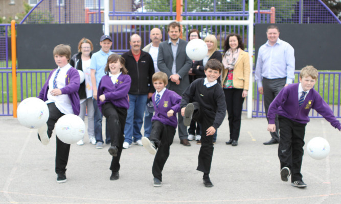 Smiling faces at the launch despite the vandals' efforts to spoil it.