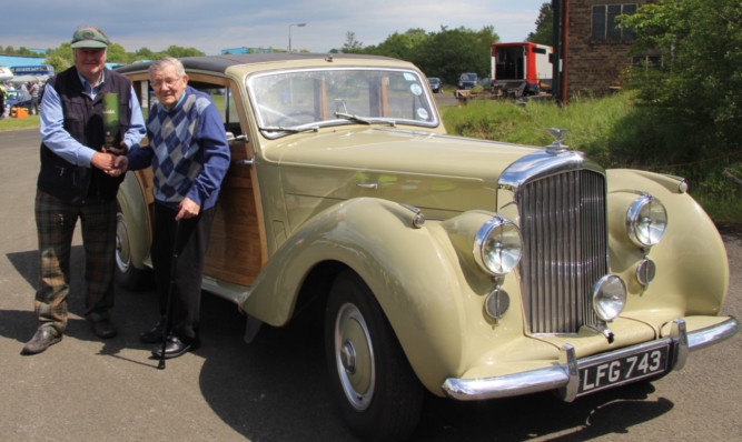 Jimmy Allison (right) is reunited with his old Bentley and its owner Allan Stewart.
