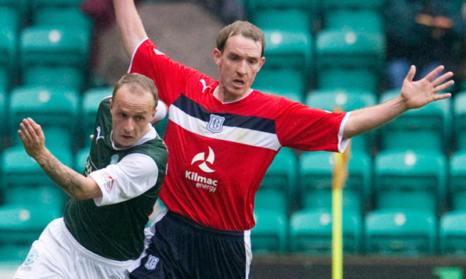 Gary Irvine (right) facing up to former Dundee man Leigh Griffiths in the SPL last season.