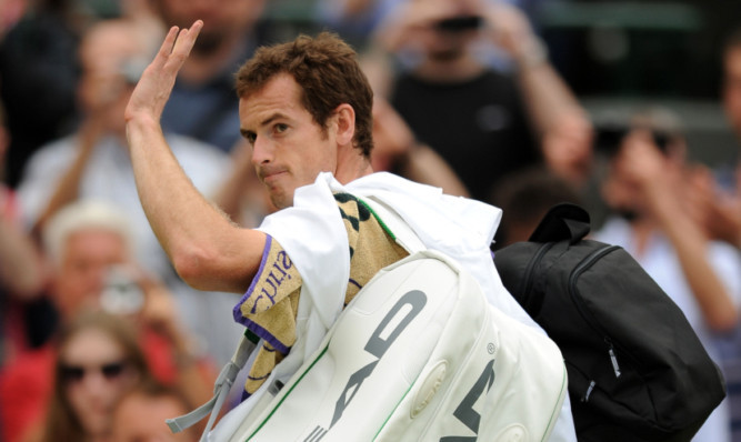 Andy Murray gets off court unscathed on a memorable day at Wimbledon.