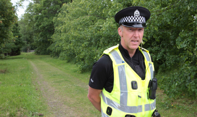 PC Graham Ogilvie near the investigation scene.