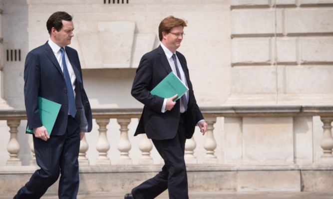 Chancellor George Osborne and Chief Secretary to the Treasury Danny Alexander leave the Treasury to present spending review.