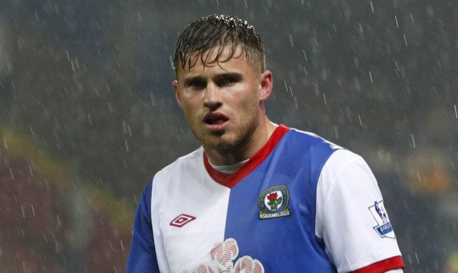 Blackburn Rovers tussles for possesion with Wigan Athletic's. PRESS ASSOCIATION Photo. Picture date: Monday May 7 , 2012. See PA story  Photo credit should read: Peter Byrne/PA Wire