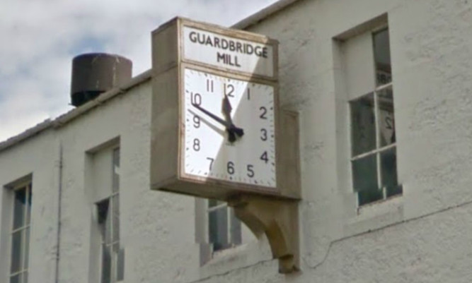 The clock on the former Guardbridge paper mill.