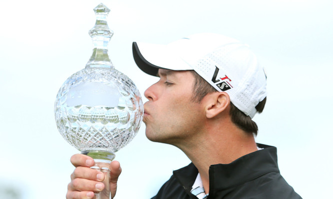 Paul Casey celebrates after winning the Irish Open.