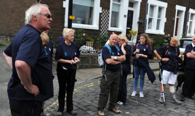 Jim Leishman, left, and fellow Dander for Mary walkers.