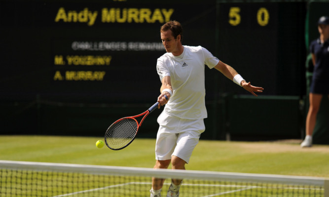 Andy Murray in action against Russia's Mikhail Youzhny.