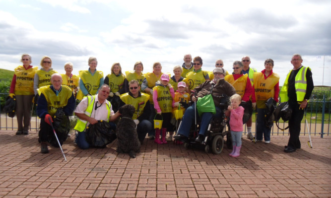 Some of the volunteers who joined forces to help clean up the beach at Carnoustie at the weekend.